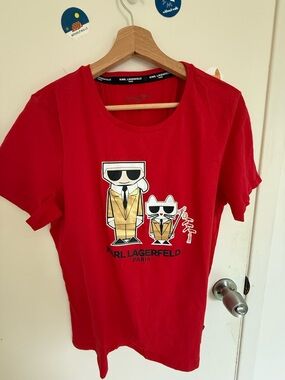 New Karl Lagerfeld Red Graphic Tee with Gold & Black Cartoon Print - Size L